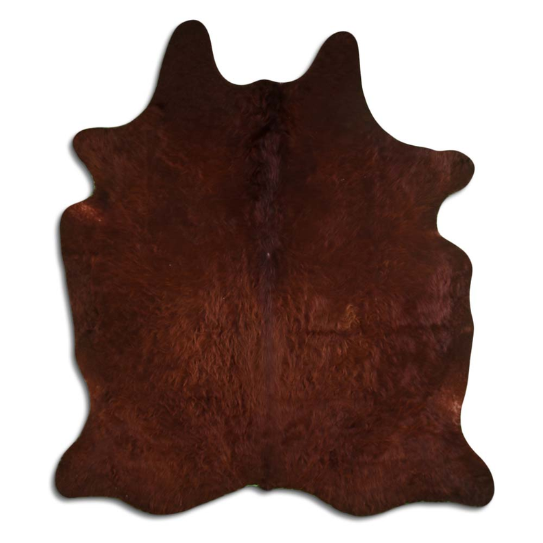 Brown cowhide rug with natural hair, irregular hide shape