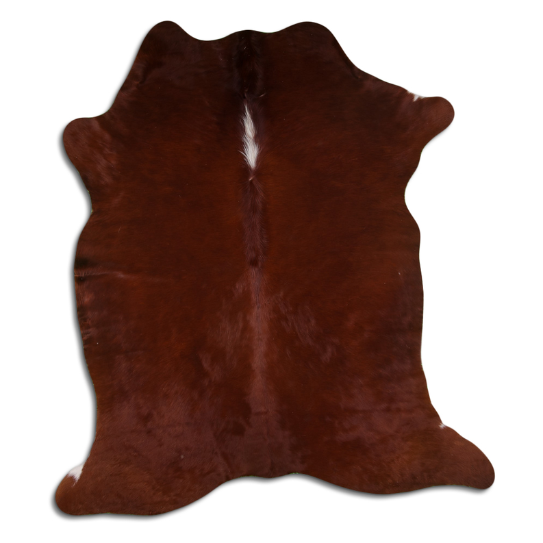Brown cowhide rug with natural hair, irregular shape