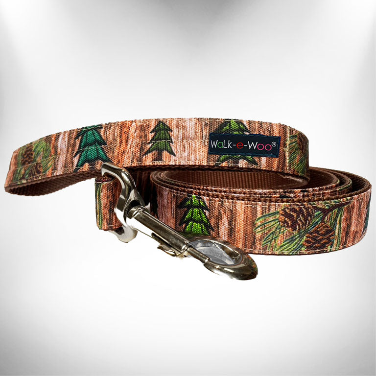 Brown leaf-pattern dog leash with metal clasp and Walk-e-Woo brand patch