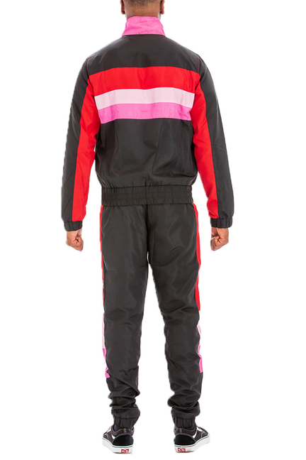 Winslow windbreaker track set back: black jacket and pants with red and pink color-blocking