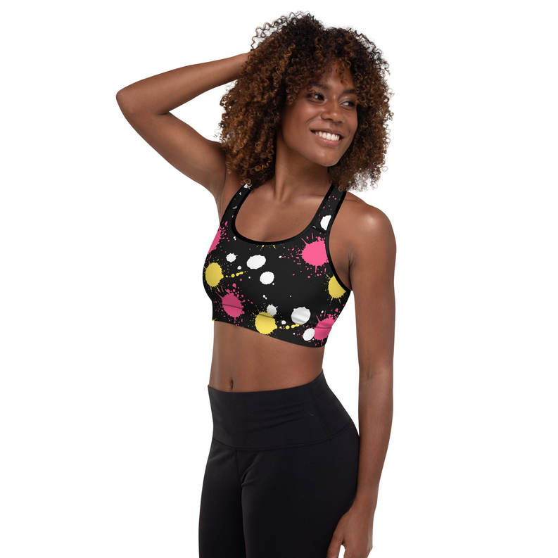 Padded sports bra with black splash print and wide racerback shoulder straps