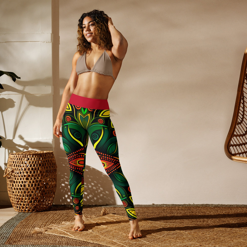 Printed yoga leggings in green with red waistband, yellow and orange geometric motifs