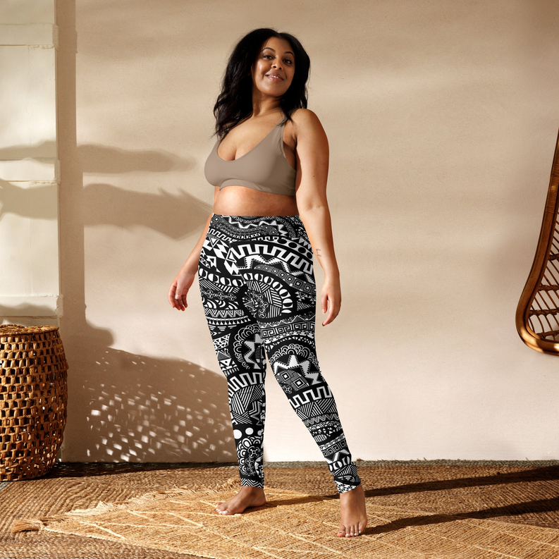 Patterned yoga leggings with black base and white geometric motif