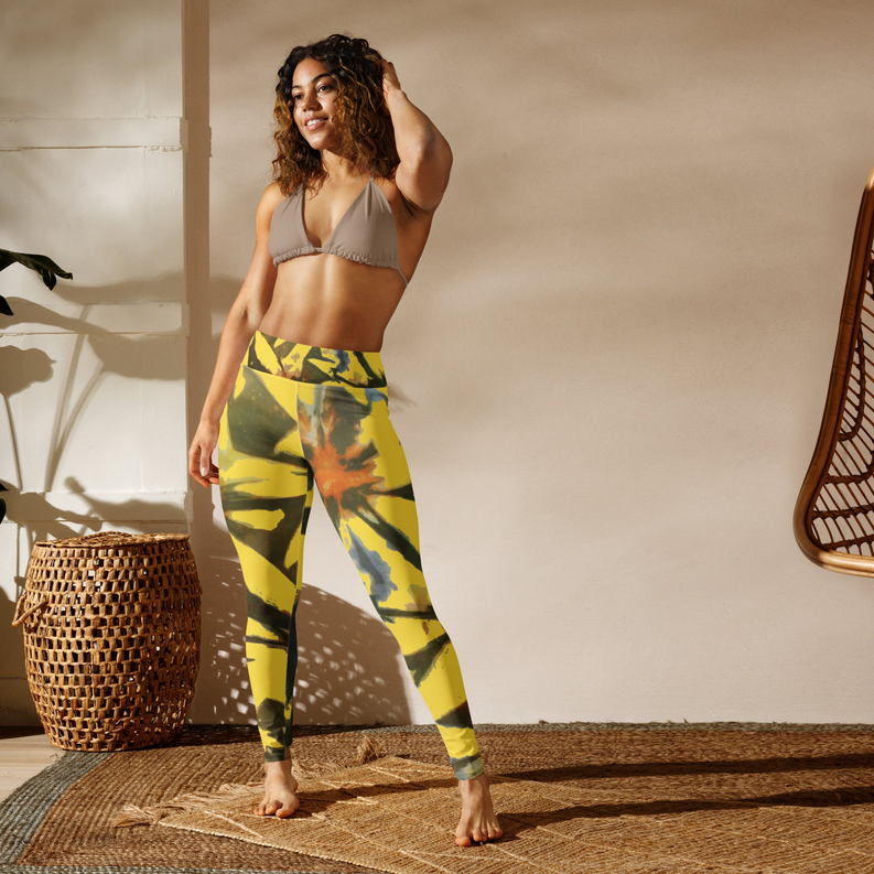 Yellow tie-dye yoga leggings with abstract green and brown splashes