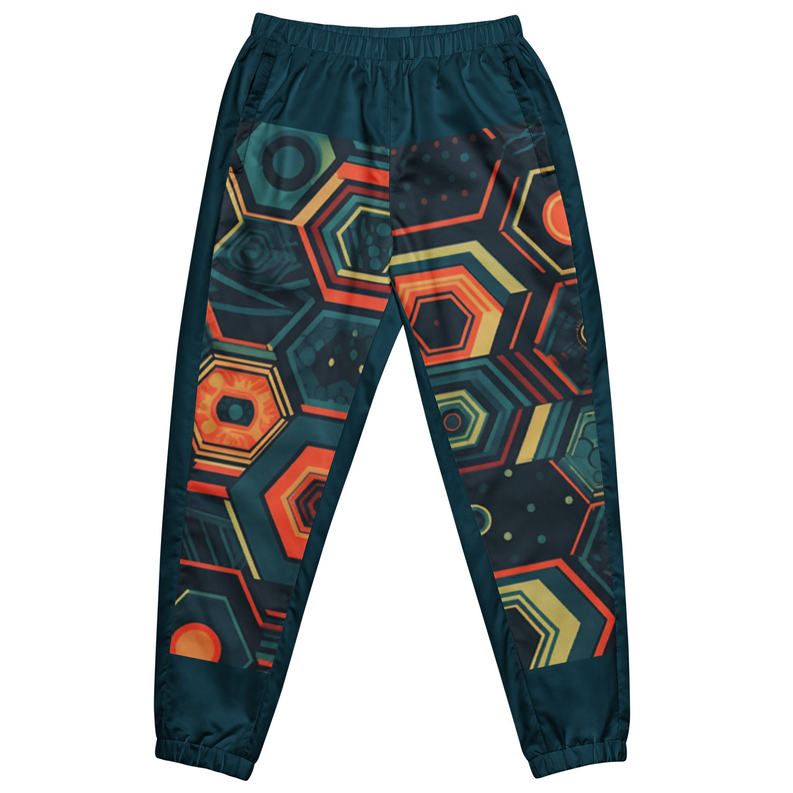 Navy track pants with geometric hexagon print and elastic ankle cuffs