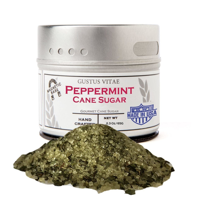 Peppermint cane sugar tin with green sugar crystals pile