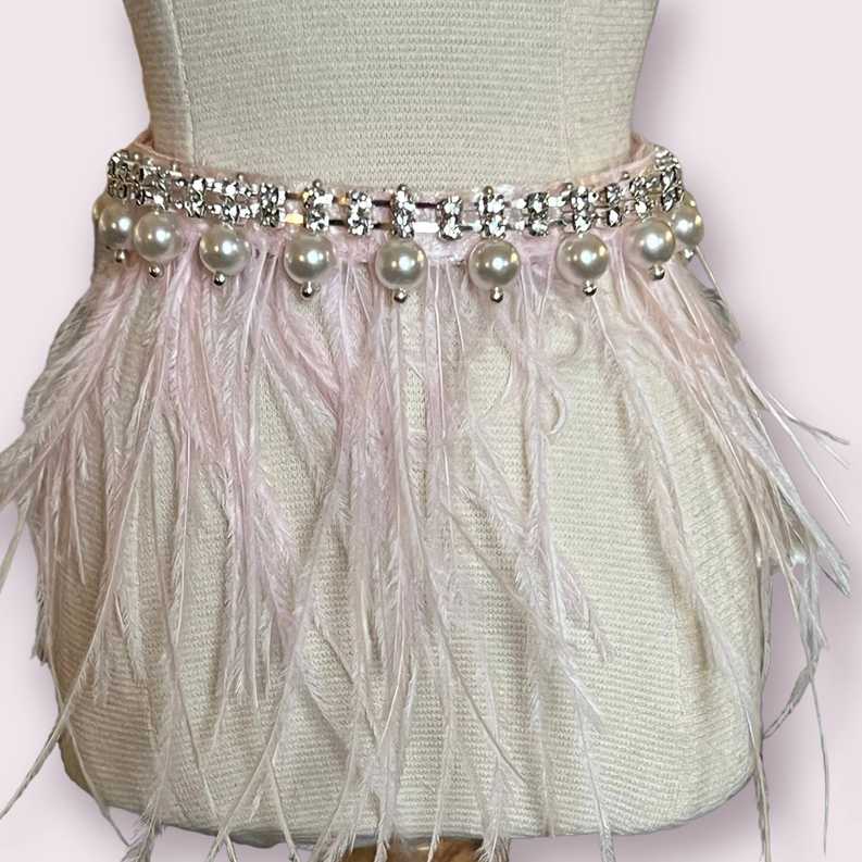 Pink feather glam collar with pearl drops and rhinestone trim along the top band