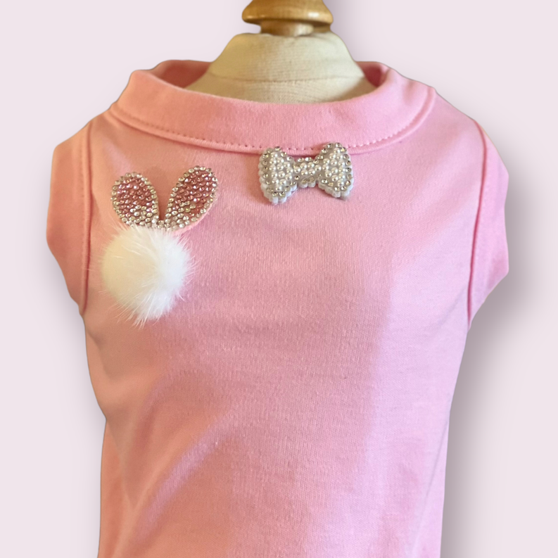 Pink dog shirt with glitter bow and fuzzy bunny pom on back