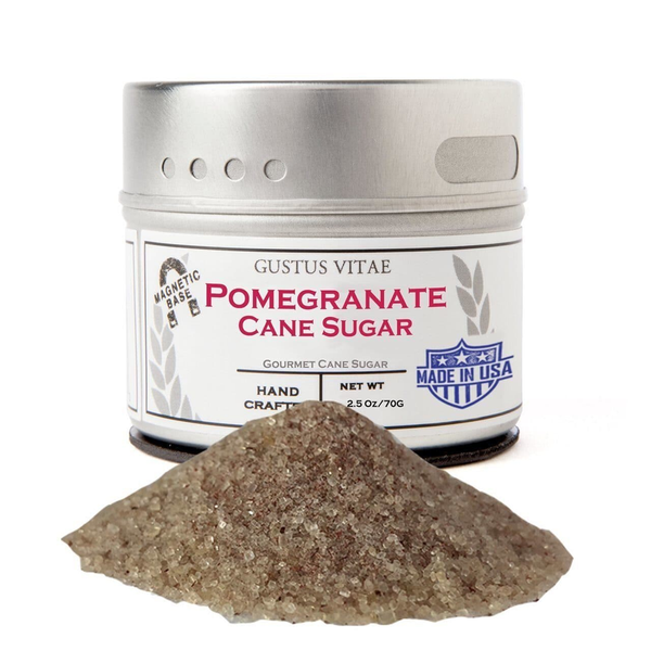 Pomegranate cane sugar jar with open label and mound of sugar crystals