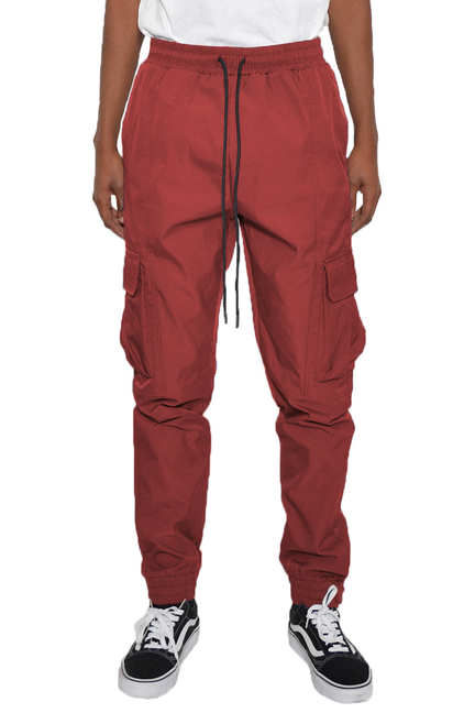 Rust cargo jogger pants with drawstring elastic waist and side cargo pockets