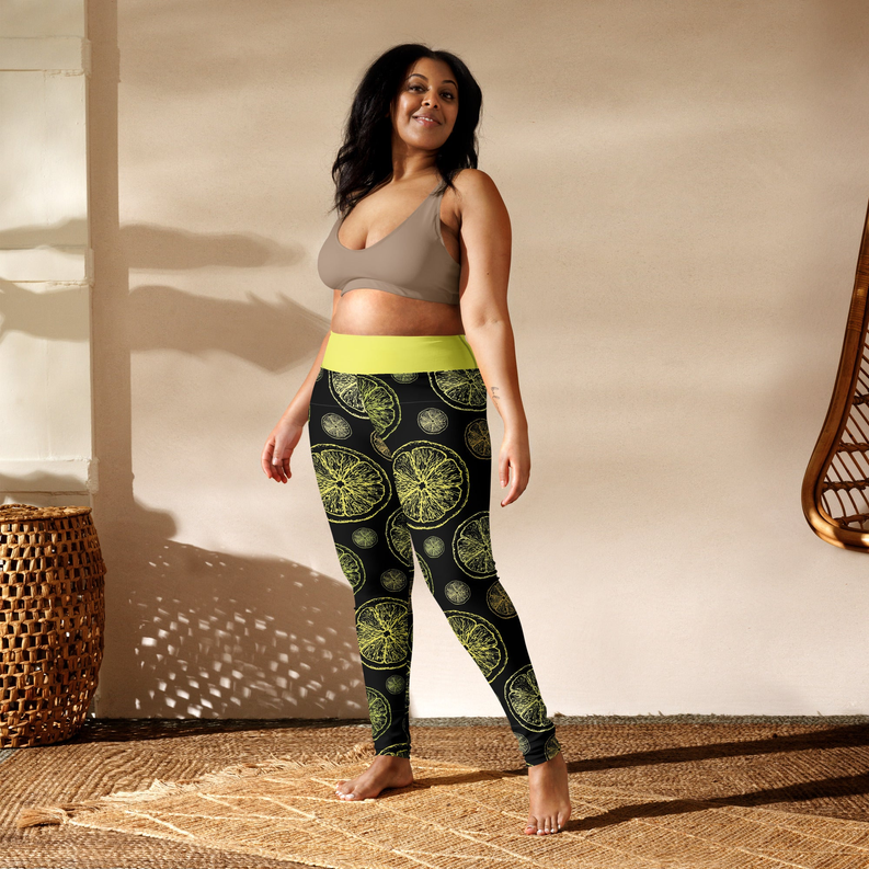High-waist ankle-length leggings, black base with lime citrus pattern and neon yellow band