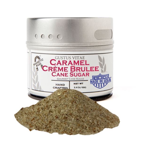 Caramel creme brulee cane sugar tin with scoop of brown sugar granules
