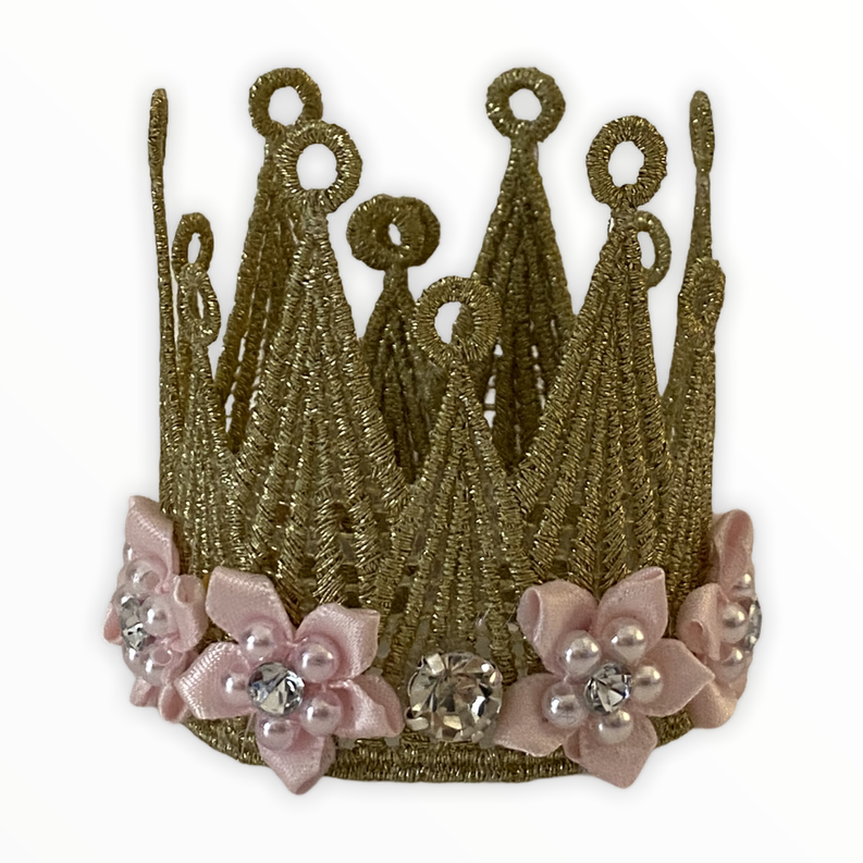 Gold beaded crown with pink floral lace trim and rhinestone jeweled center