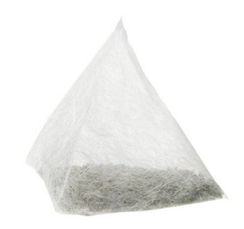 Triangular black tea sachet bag filled with loose tea leaves