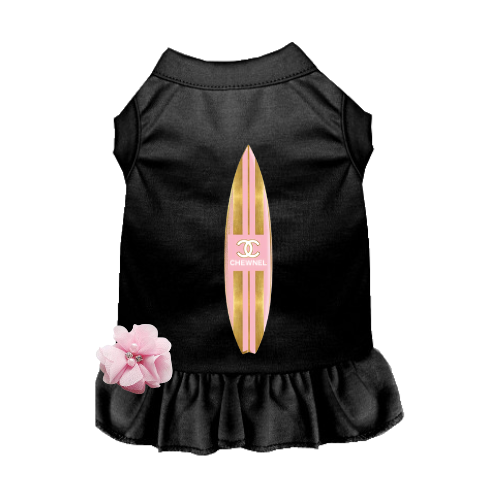 Black dog dress with surfboard graphic and ruffled skirt, sleeveless with pink flower detail