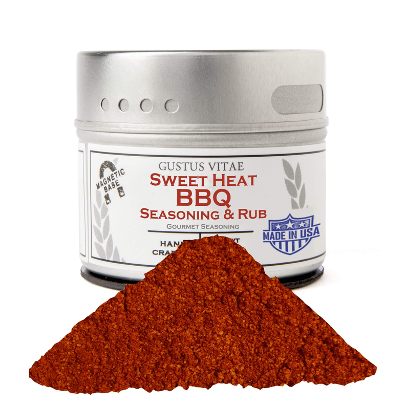BBQ seasoning rub jar with mound of red-orange spice blend