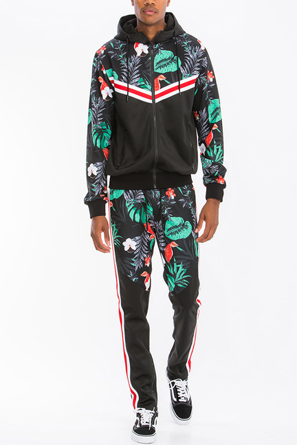 Black printed track set: jacket and joggers with tropical leaf/bird print and red side stripes