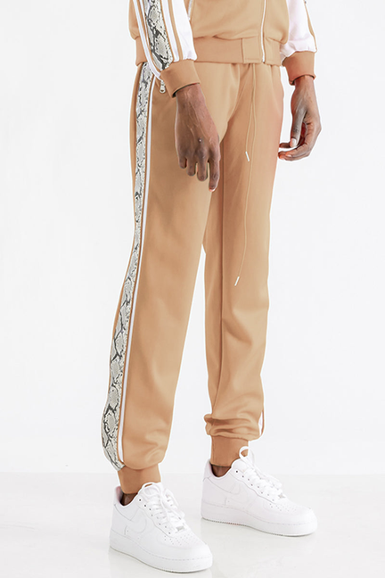 Khaki joggers with snake-print side stripe, drawstring waist, cuffed legs