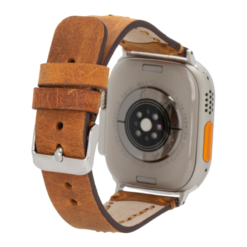 Brown leather watch band with metal buckle and stitched strap, visible screw holes.