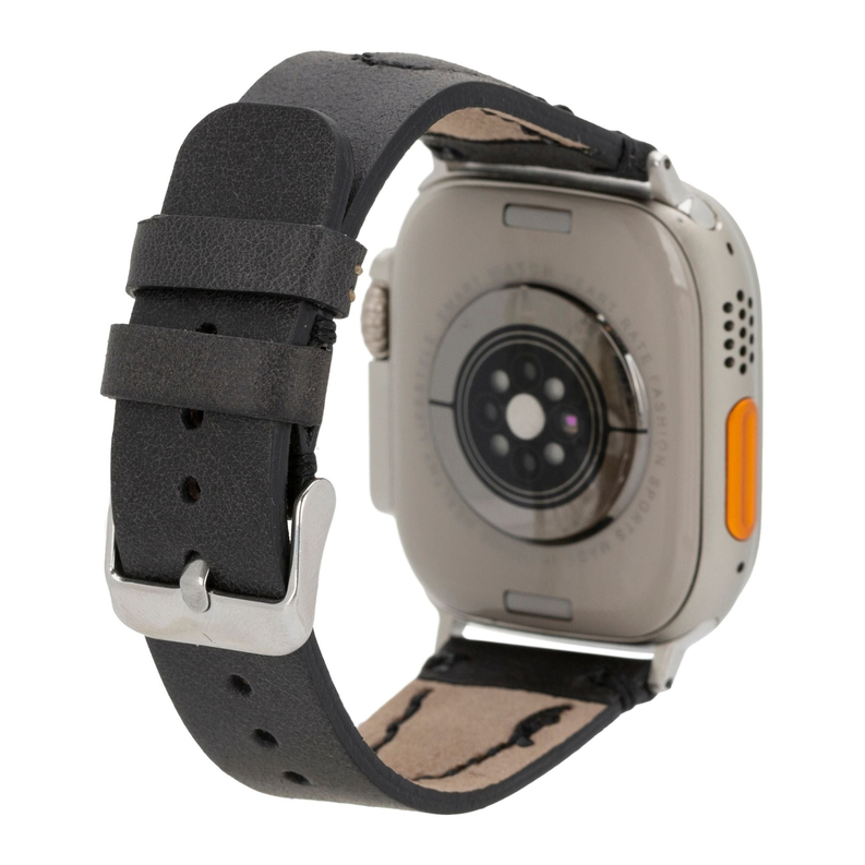 Black leather Apple Watch band with silver buckle, watch side view