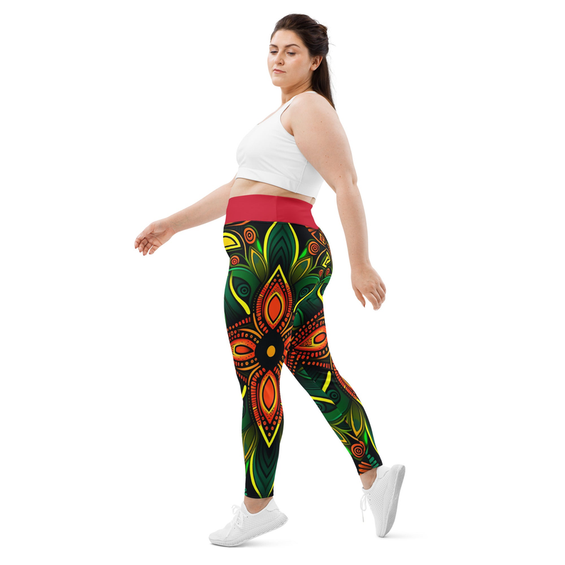 Side view print leggings with red waistband, vivid green, yellow, and orange abstract motifs