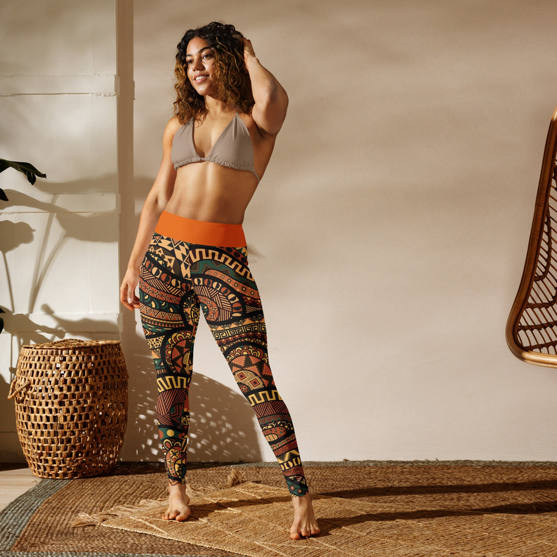 Tribal print yoga leggings with orange high-rise waistband and full-length geometric design