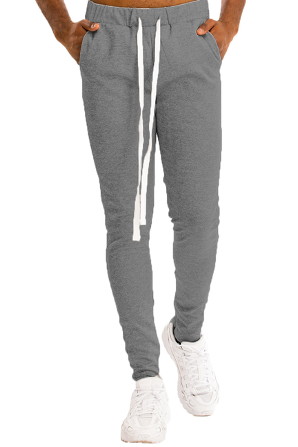 Gray track pants with elastic waistband and drawstring, side pockets, ankle cuffs