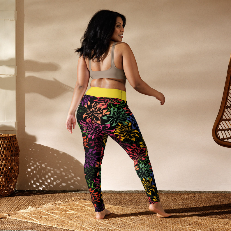 Women’s yoga leggings with dark floral print and yellow high-rise waistband
