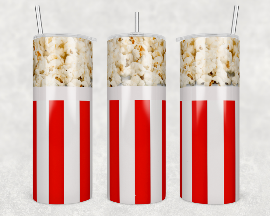 Red and white striped stainless steel tumbler with lid and two drinking straws.