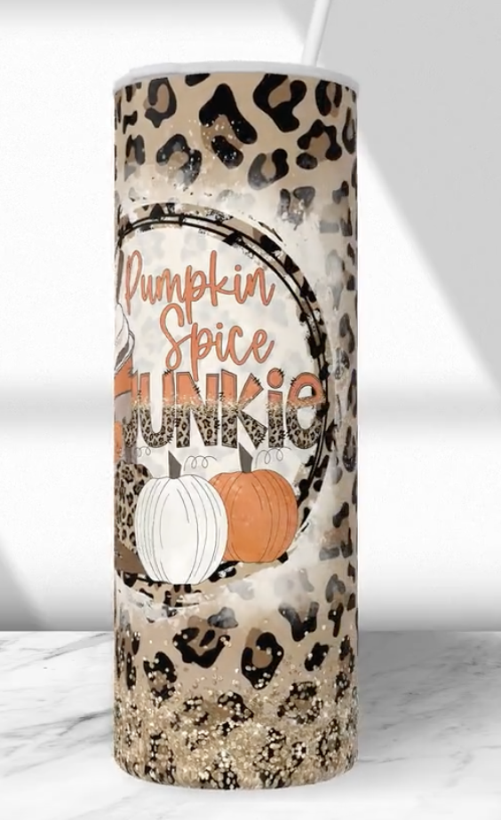 Leopard-print stainless steel tumbler with Pumpkin Spice graphic, white lid and straw opening