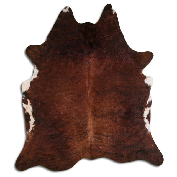 Medium brindle cowhide rug with natural hair, irregular hide shape