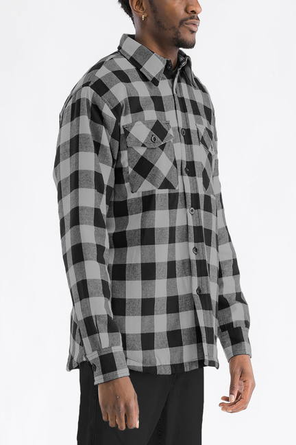 Quilted plaid flannel shirt, black and grey check, long sleeves with button cuffs, front view