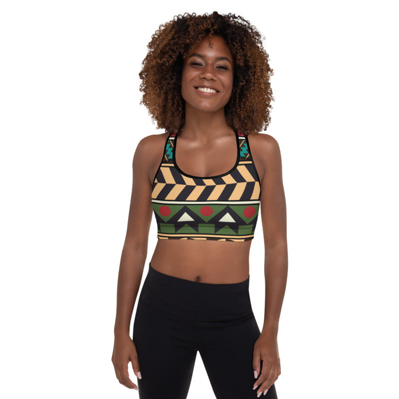 Geometric padded sports bra on model, scoop front and wide straps