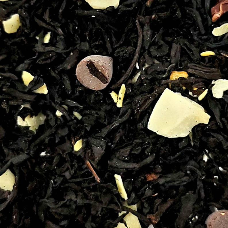 Close-up of loose-leaf black tea with cocoa nibs and chocolate chips