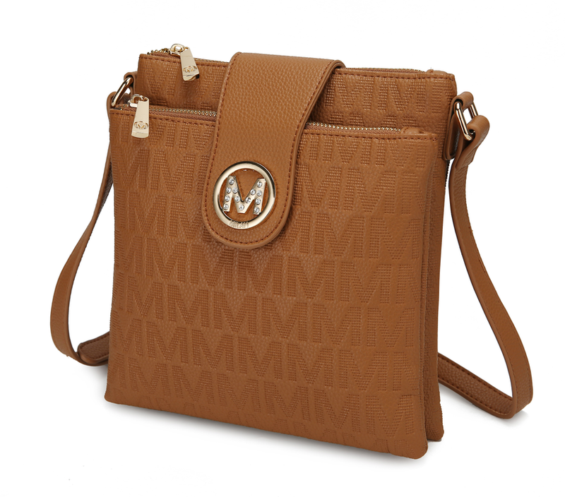 Brown crossbody bag with front oval logo plaque and zip-top closure