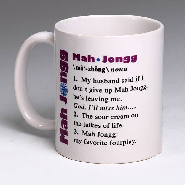 White ceramic Mah Jongg mug with purple 'Mah-Jongg' and quote text