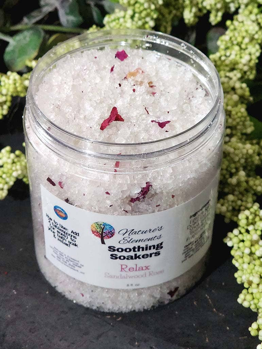 Bath soak jar with white crystals and pink flower petals, Relax scent, clear screw-top