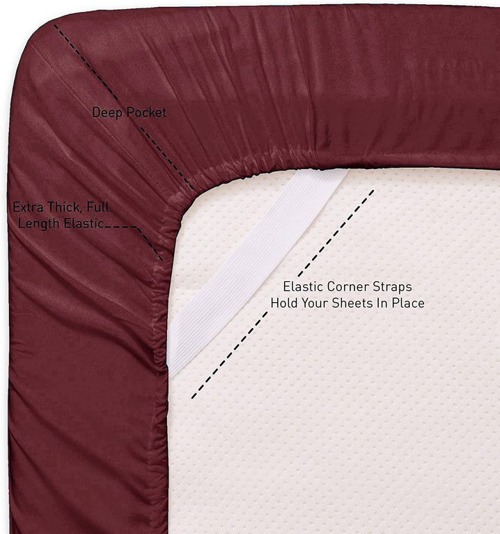 Burgundy fitted sheet with elastic corner straps and deep pocket, textured fabric