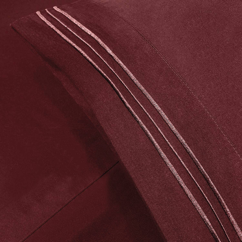 Burgundy embroidered sheet border with three parallel stitched lines