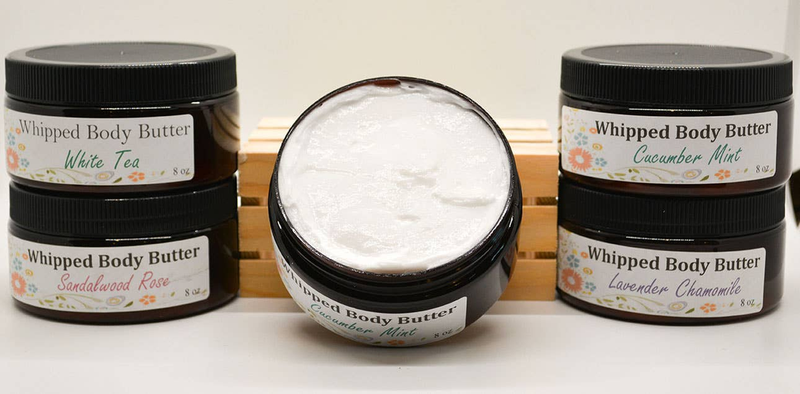 Whipped body butter set: three jars with black lids and an open tub top
