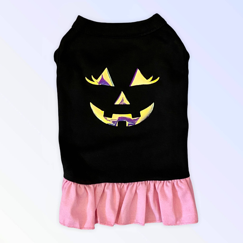 Black Halloween pet shirt with iridescent jack-o-lantern face and pink ruffle hem
