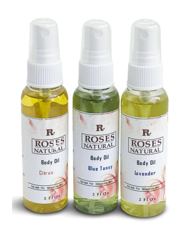 Three Roses Natural body oil bottles: Citrus, Blue Tansy, Lavender with spray tops
