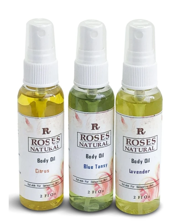 Body oil set of three bottles with citrus, blue tansy, and lavender scents.