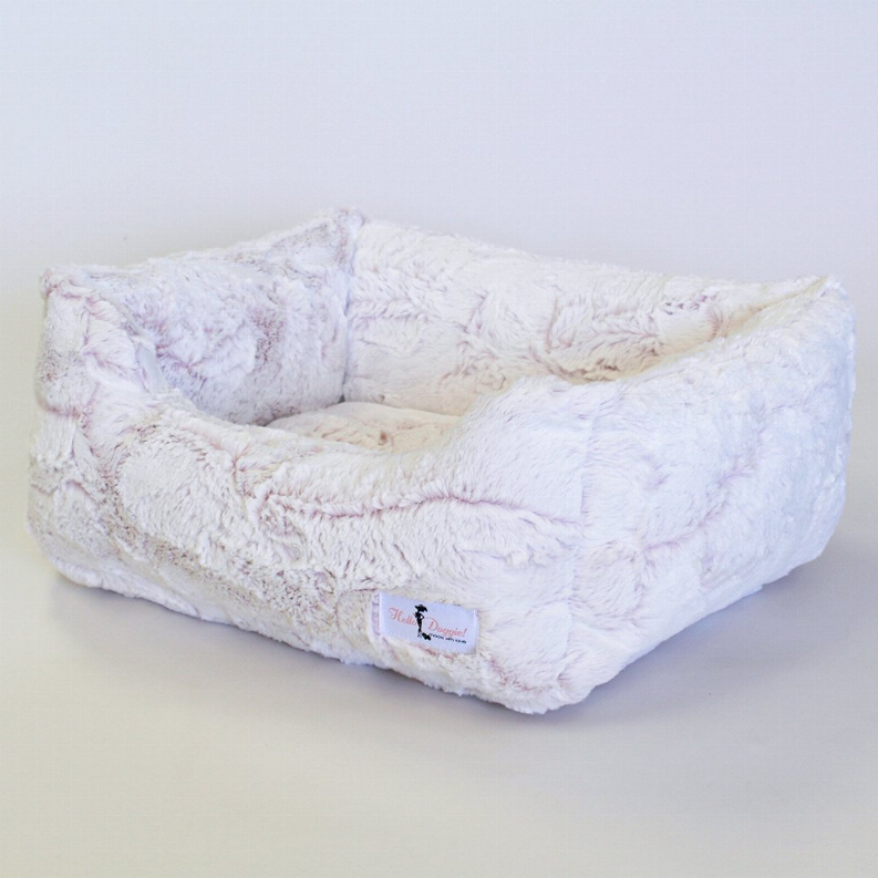 Plush rectangular dog bed with raised sides and light-colored cover, open top.