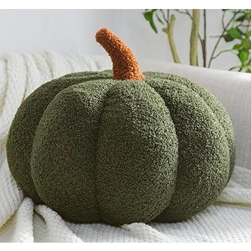 Boucle pumpkin pillow in dark green with textured plush and brown stem detail