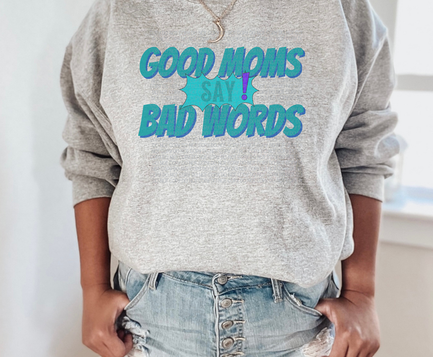 Heather gray crewneck sweatshirt with teal 'Good Moms Say Bad Words' graphic