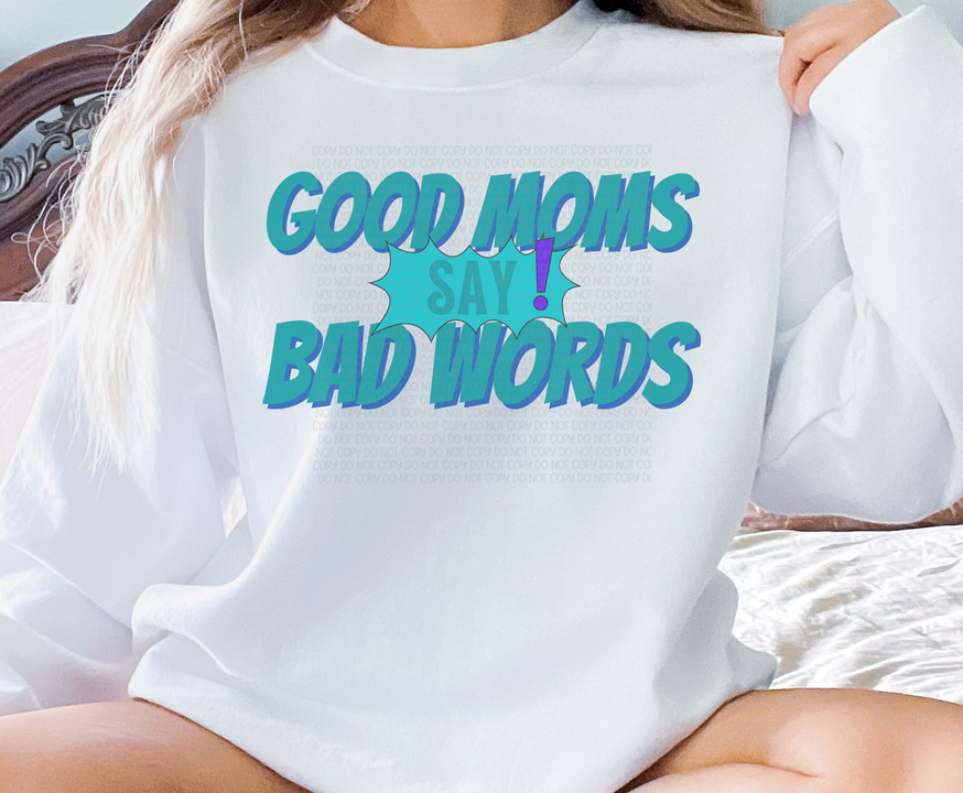 White crewneck sweatshirt with teal 'Good Moms Say Bad Words' graphic