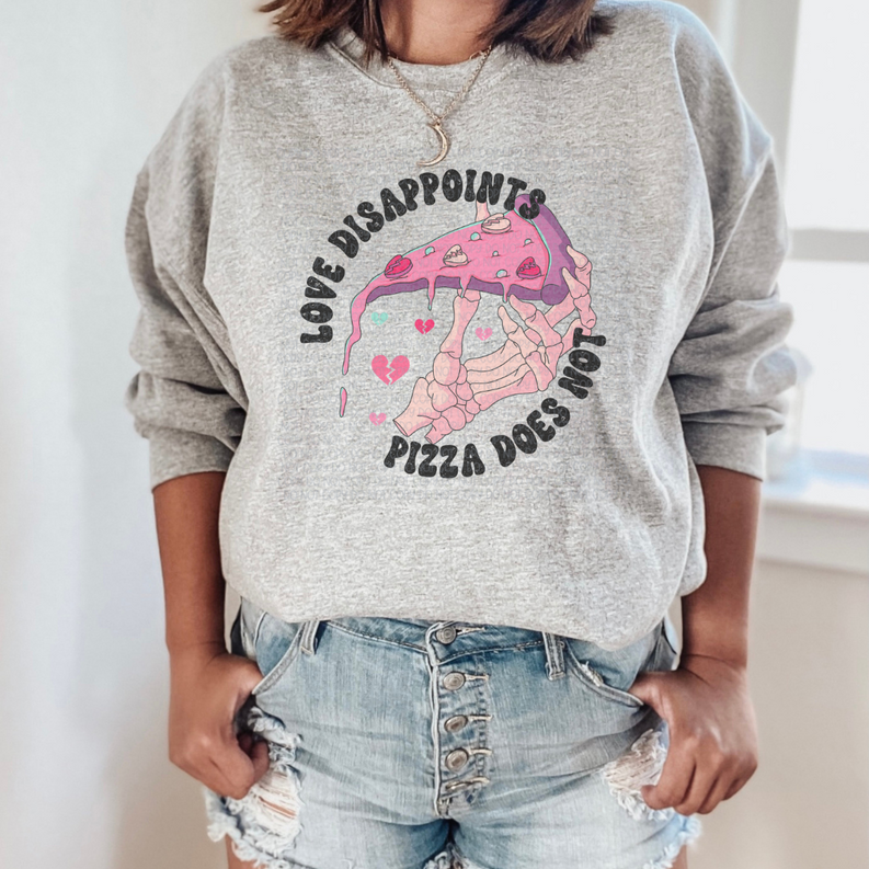 Light gray crewneck sweatshirt with pink pizza graphic and heart details