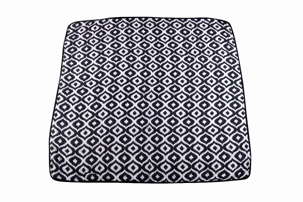 Navy and white geometric diamond blanket with rounded stitched edges