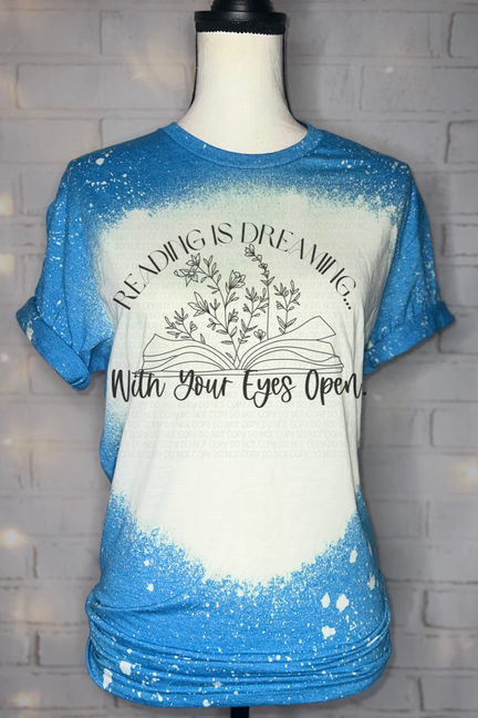 Bleached blue graphic tee with round neck and large front print